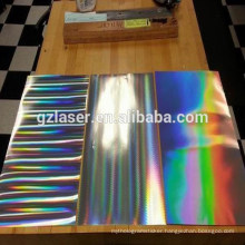 Holographic plastic rainbow film with pillar of light pattern